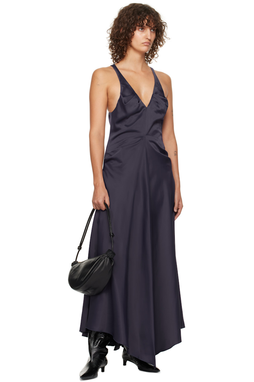 Acetate satin midi dress.

· Pleats at plunging V-neck and waist
· Seam pockets 
· Concealed zip closure at side
· Asymmetric hem
· Racer back
· Godet panel at back hem
· Full crepe de chine lining

Supplier color: Ink blue