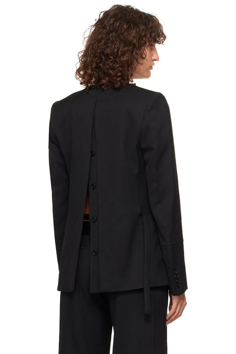 Polyester- and virgin wool-blend barathea blazer. Concealed double-breasted button vent at back for alternate styling. 

· Plunging V-neck
· Concealed button closure
· Welt pocket 
· Flap pockets
· Detachable self-tie belt
· Padded shoulders
· Four-button surgeon's cuffs
· Full satin lining

Supplier color: Black