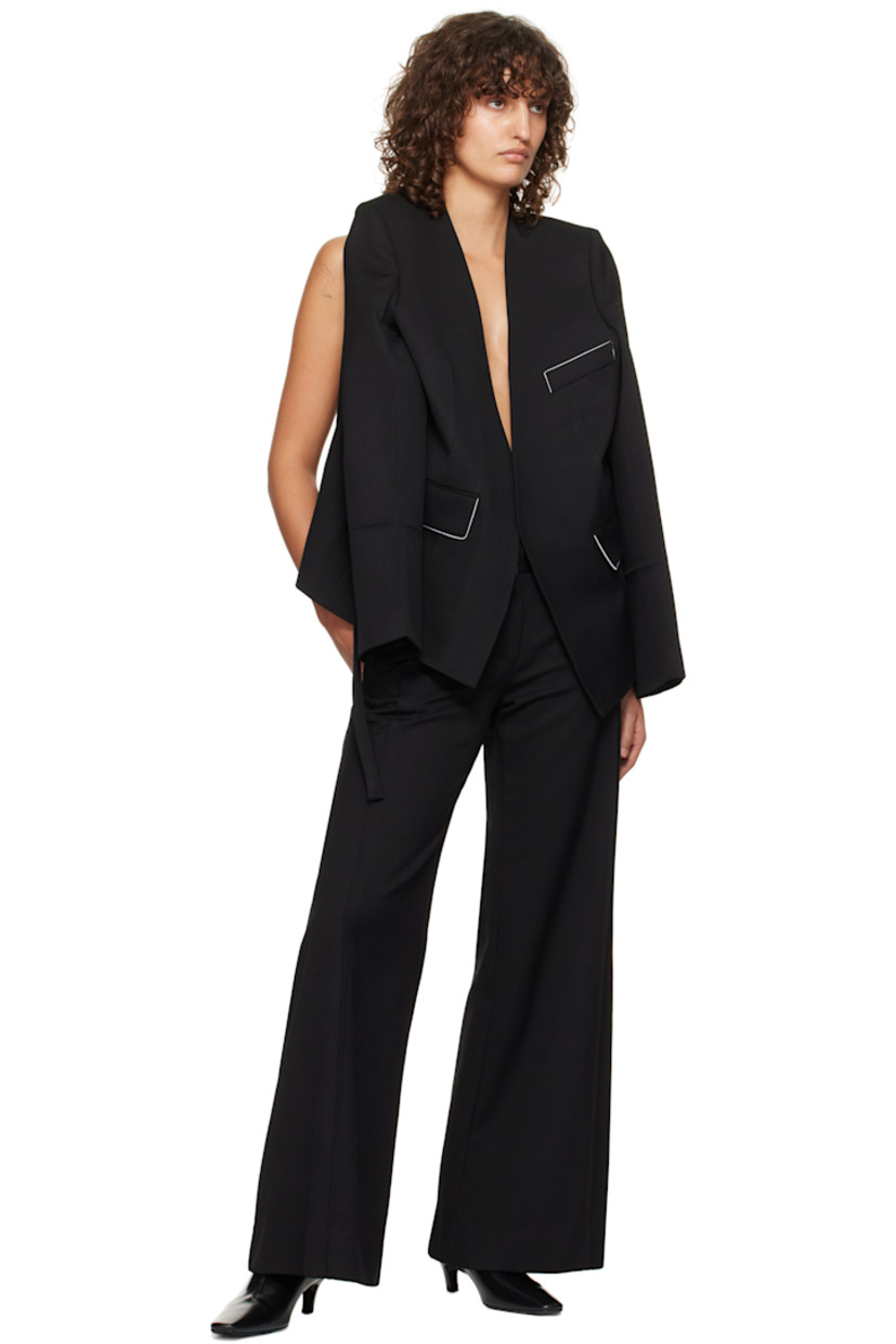 Polyester- and virgin wool-blend barathea blazer. Concealed double-breasted button vent at back for alternate styling. 

· Plunging V-neck
· Concealed button closure
· Welt pocket 
· Flap pockets
· Detachable self-tie belt
· Padded shoulders
· Four-button surgeon's cuffs
· Full satin lining

Supplier color: Black