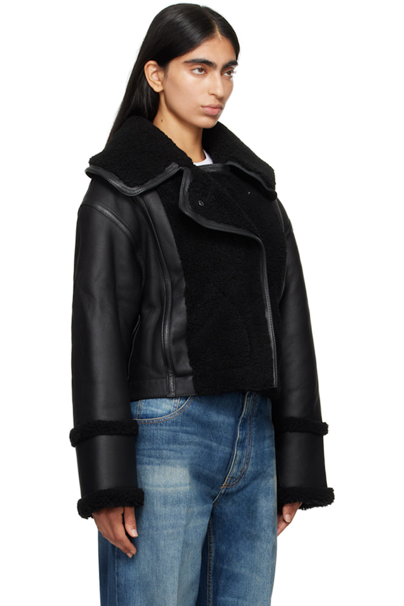 Grained lambskin and shearling jacket. 

· Paneled construction
· Spread collar
· Concealed offset press-stud closure 
· Welt pockets
· Cropped hem
· Full shearling lining

Supplier color: Black/Black