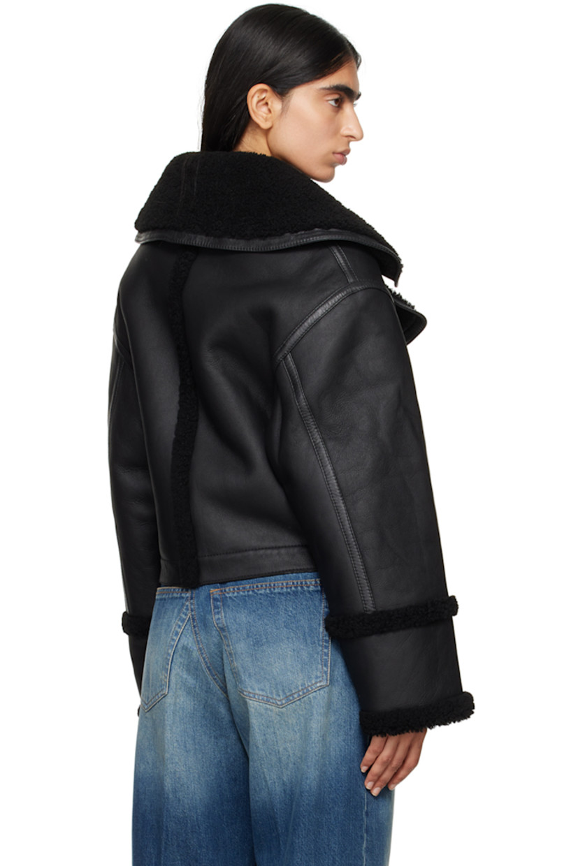 Grained lambskin and shearling jacket. 

· Paneled construction
· Spread collar
· Concealed offset press-stud closure 
· Welt pockets
· Cropped hem
· Full shearling lining

Supplier color: Black/Black
