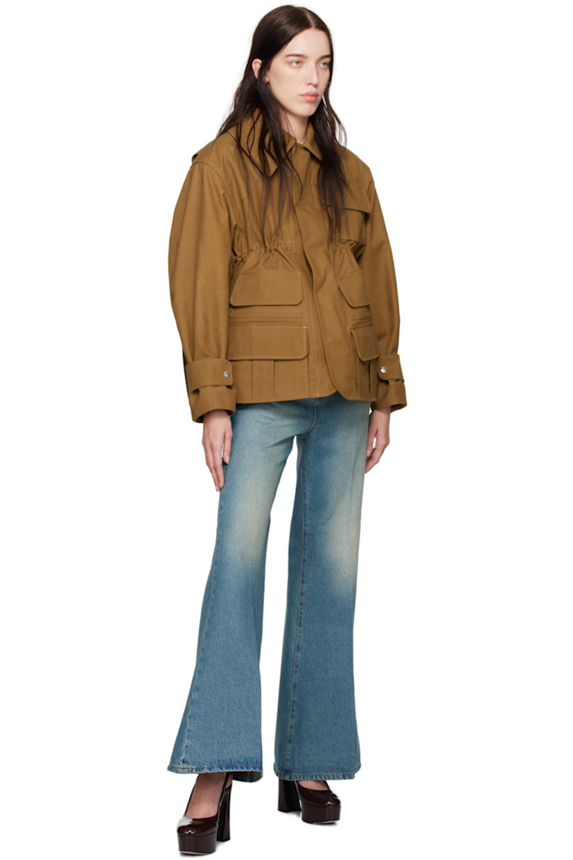 Wide-leg non-stretch denim jeans. Whiskering and fading throughout.

· Garment-dyed
· High-rise
· Belt loops
· Five-pocket styling
· Zip-fly
· Central creases at front and back
· Leather logo patch at back waistband 

Supplier color: Tinted blue wash
