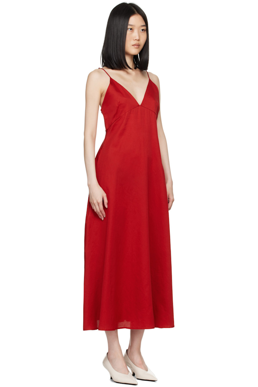 A-line cotton sateen dress.

· Plunging V-neck
· Darts at cups
· Seam pockets
· Adjustable spaghetti straps
· Low back
· Partially lined

Supplier color: Red