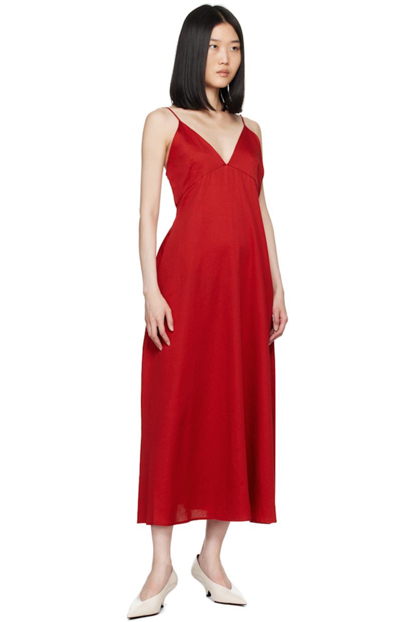 A-line cotton sateen dress.

· Plunging V-neck
· Darts at cups
· Seam pockets
· Adjustable spaghetti straps
· Low back
· Partially lined

Supplier color: Red