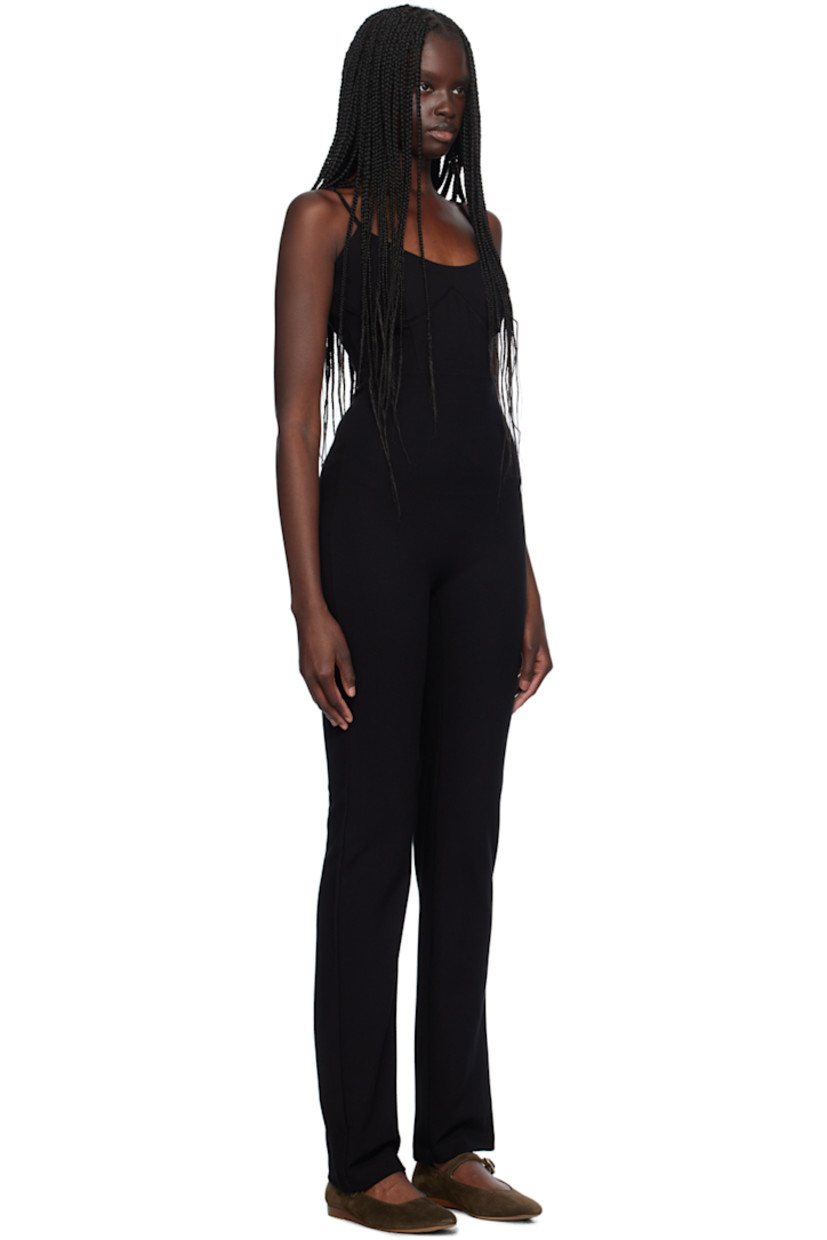 Stretch viscose-blend ponte jersey jumpsuit.

· Scoop neck
· Bustier-style bodice
· Adjustable spaghetti straps
· Low back

Supplier color: Black