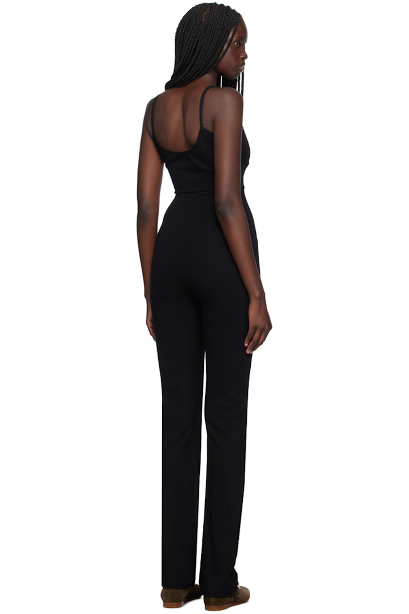 Stretch viscose-blend ponte jersey jumpsuit.

· Scoop neck
· Bustier-style bodice
· Adjustable spaghetti straps
· Low back

Supplier color: Black