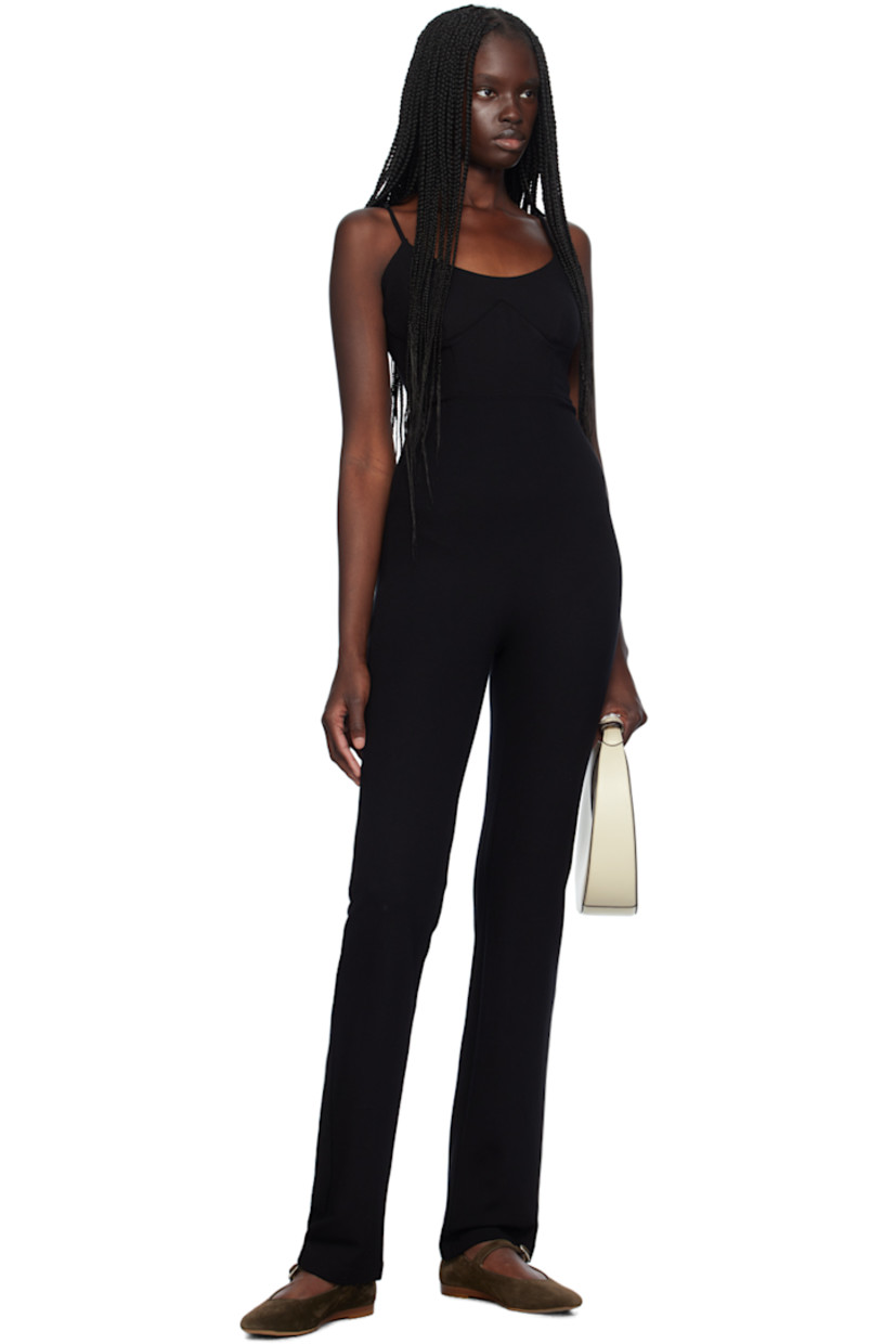 Stretch viscose-blend ponte jersey jumpsuit.

· Scoop neck
· Bustier-style bodice
· Adjustable spaghetti straps
· Low back

Supplier color: Black