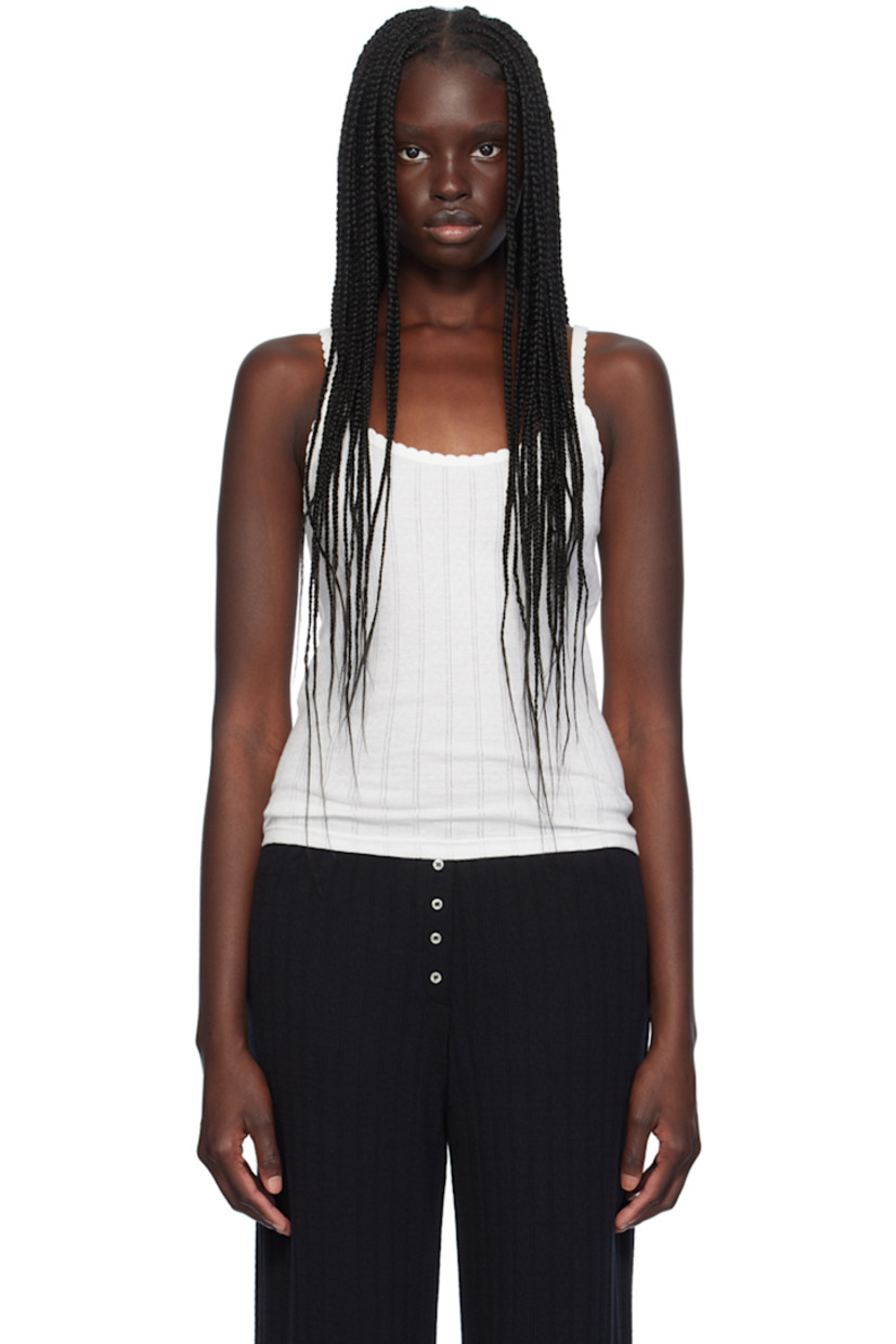 Pointelle knit cotton tank top. Scalloped edge at rib knit scoop neck and spaghetti straps.

Supplier color: White