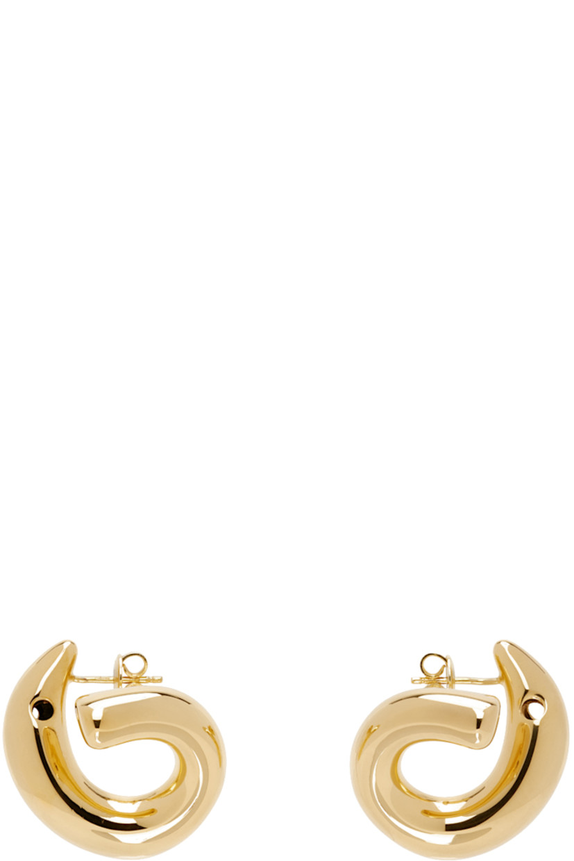Pair of open hoop earrings in 18k gold-plated sterling silver.

· Post-stud fastening
· D1"

Supplier color: Yellow gold