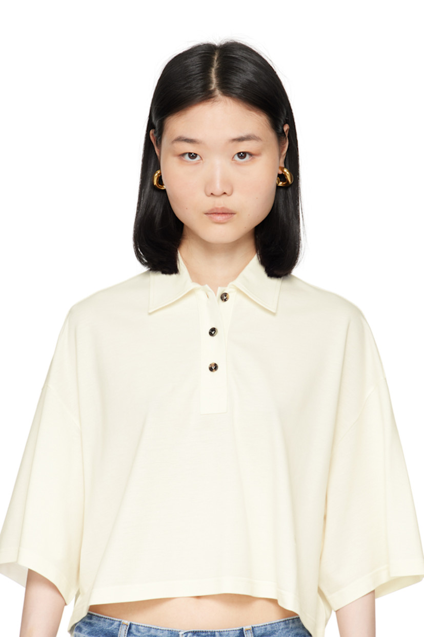 Pair of open hoop earrings in 18k gold-plated sterling silver.

· Post-stud fastening
· D1"

Supplier color: Yellow gold
