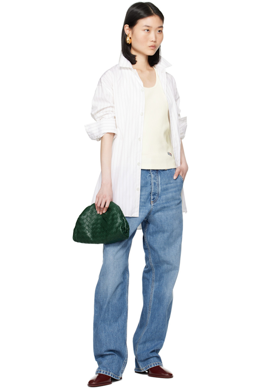 Non-stretch denim jeans. Fading and whiskering throughout. 

· Belt loops
· Five-pocket styling
· Button-fly
· Patch pockets at outseams
· Hammer loop at outseam and back pocket
· Logo patch at back waistband
· Contrast stitching in tan
 
Supplier color: Mid blue