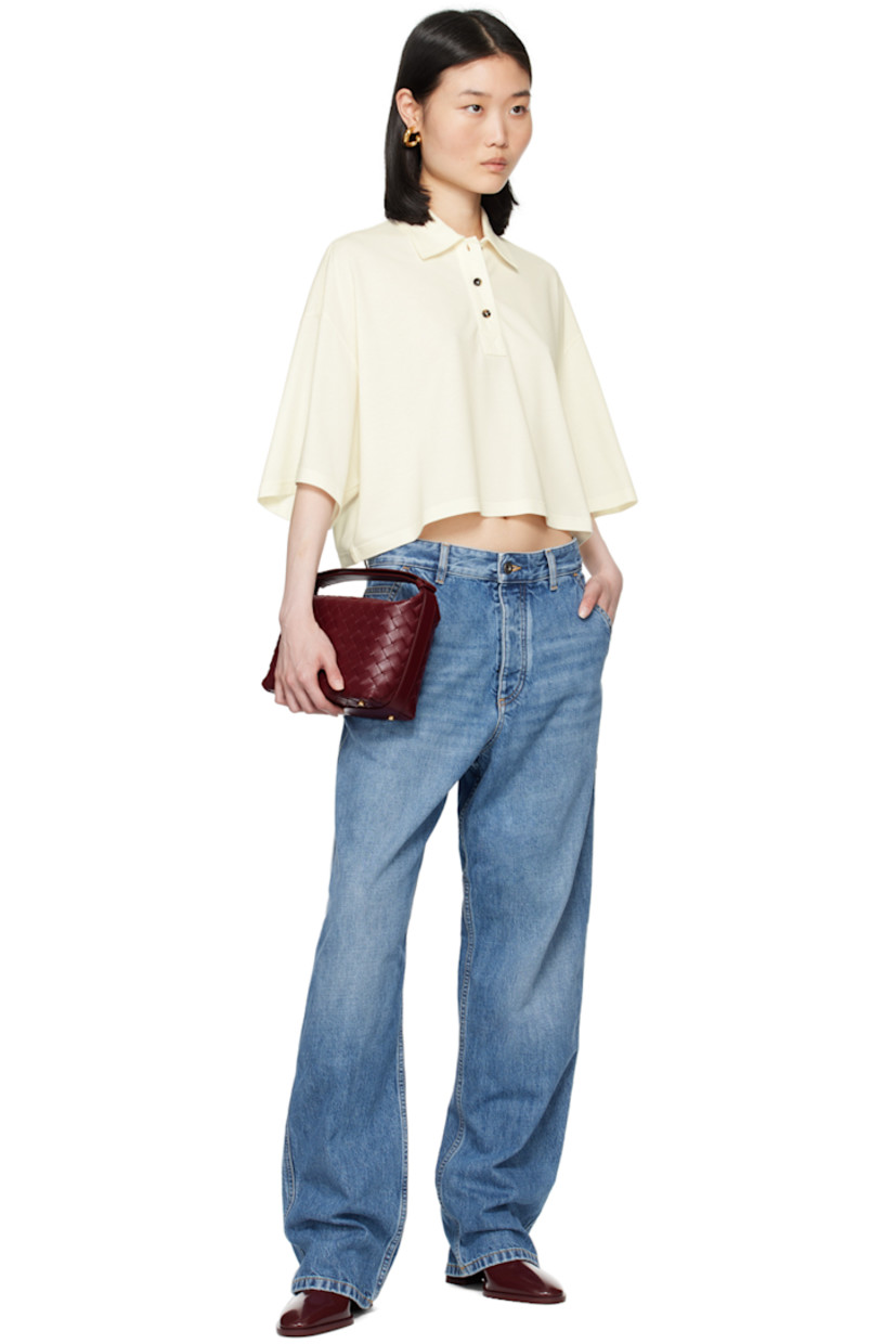 Cotton- and lyocell-blend piqué polo.

· Spread collar
· Three-button placket
· Logo embroidered at front
· Cropped hem
· Dropped shoulders

Supplier color: Dove