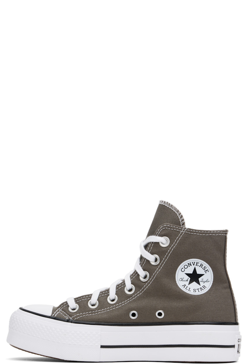 High-top canvas sneakers in gray.

· Rubber cap toe
· Lace-up closure
· Logo patch and eyelets at inner side
· Mesh lining
· OrthoLite cushioning insole
· Logo patch at heel
· Treaded rubber platform sole
· Platform: H1.5"

Supplier color:  Charcoal/White/Black