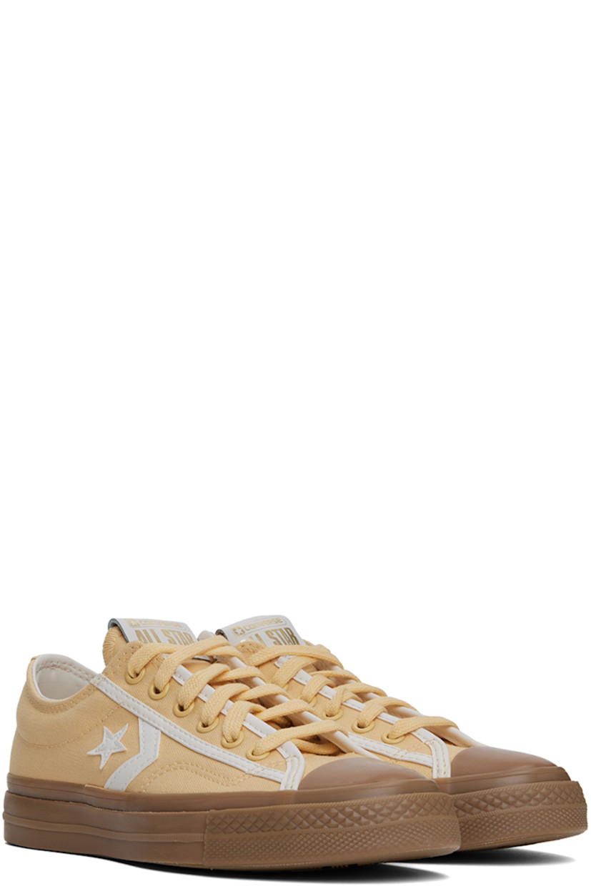 Low-top canvas sneakers in yellow.

· Buffed faux-leather trim throughout
· Rubber cap toe
· Lace-up closure
· Logo flag at tongue
· Padded collar
· Logo appliqué at sides
· Cushioned Ortholite® footbed
· Mesh lining
· Rubberized logo patch at heel
· Treaded rubber sole

Supplier color: Afternoon sun/Vintage white/Light gold