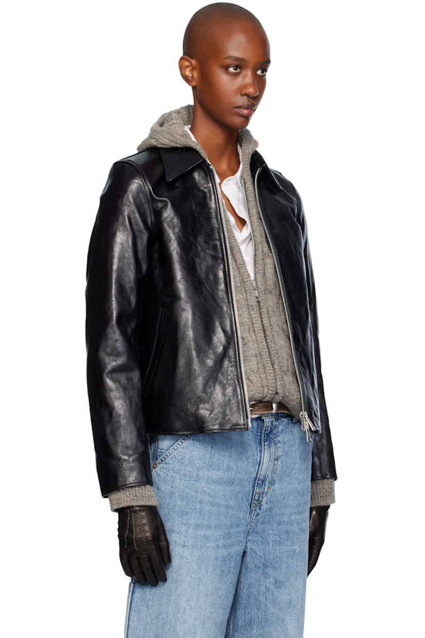 Vegetable-tanned crinkled leather jacket. 

· Spread collar
· Two-way zip closure
· Welt pockets 
· Welt pocket at interior
· Cotton-blend twill lining

Supplier color: Top dyed black