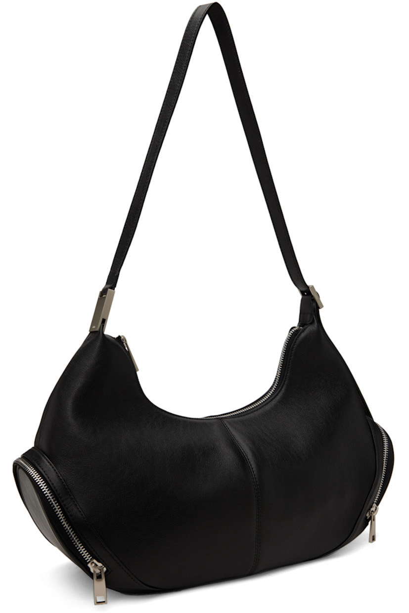 Grained leather shoulder bag in black.

· Adjustable shoulder strap
· Zip pocket at sides
· Zip closure
· Patch pocket at interior
· Brushed jersey lining
· Logo-engraved silver-tone hardware
· H9.5" x W16" x D4.5"

Supplier color: Black