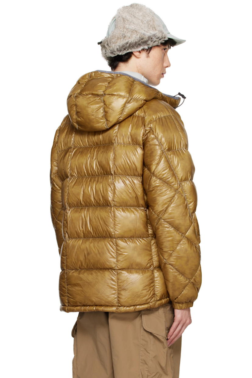 Packable down-filled and quilted Pertex Quantum nylon ripstop jacket. Lightweight, windproof, and water-resistant.

· Reflective trim throughout
· Elasticized drawstring at hood
· Two-way zip closure
· Zip pockets
· Concealed bungee-style drawstring at hem
· Raglan sleeves
· Logo bonded at sleeve
· Elasticized cuffs
· Faux-fur lining at collar

Supplier color: Camel

Fill: 90% down, 10% feather.