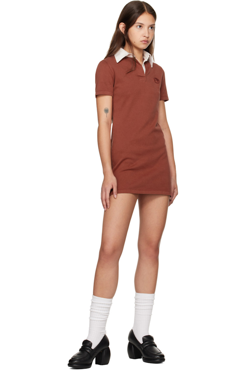 Cotton jersey minidress. 

· Twill spread collar
· Concealed three-button placket
· Logo embroidered at chest
· Vented side seams
· Graphic appliqué at back
· Mother-of-pearl hardware

Supplier color: Russet brown