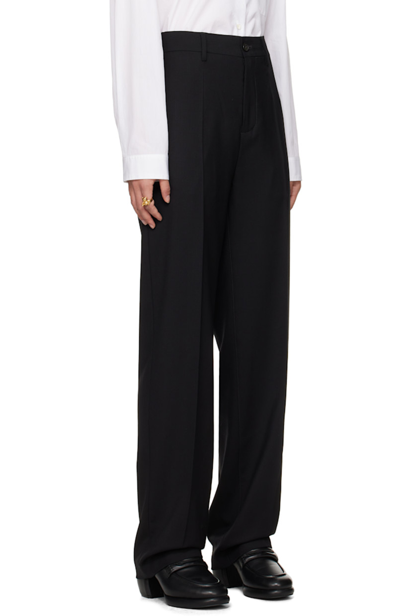 Stretch virgin wool twill trousers. 

· Belt loops
· Three-pocket styling
· Zip-fly
· Creased legs
· Partial viscose satin lining

Supplier color: Black