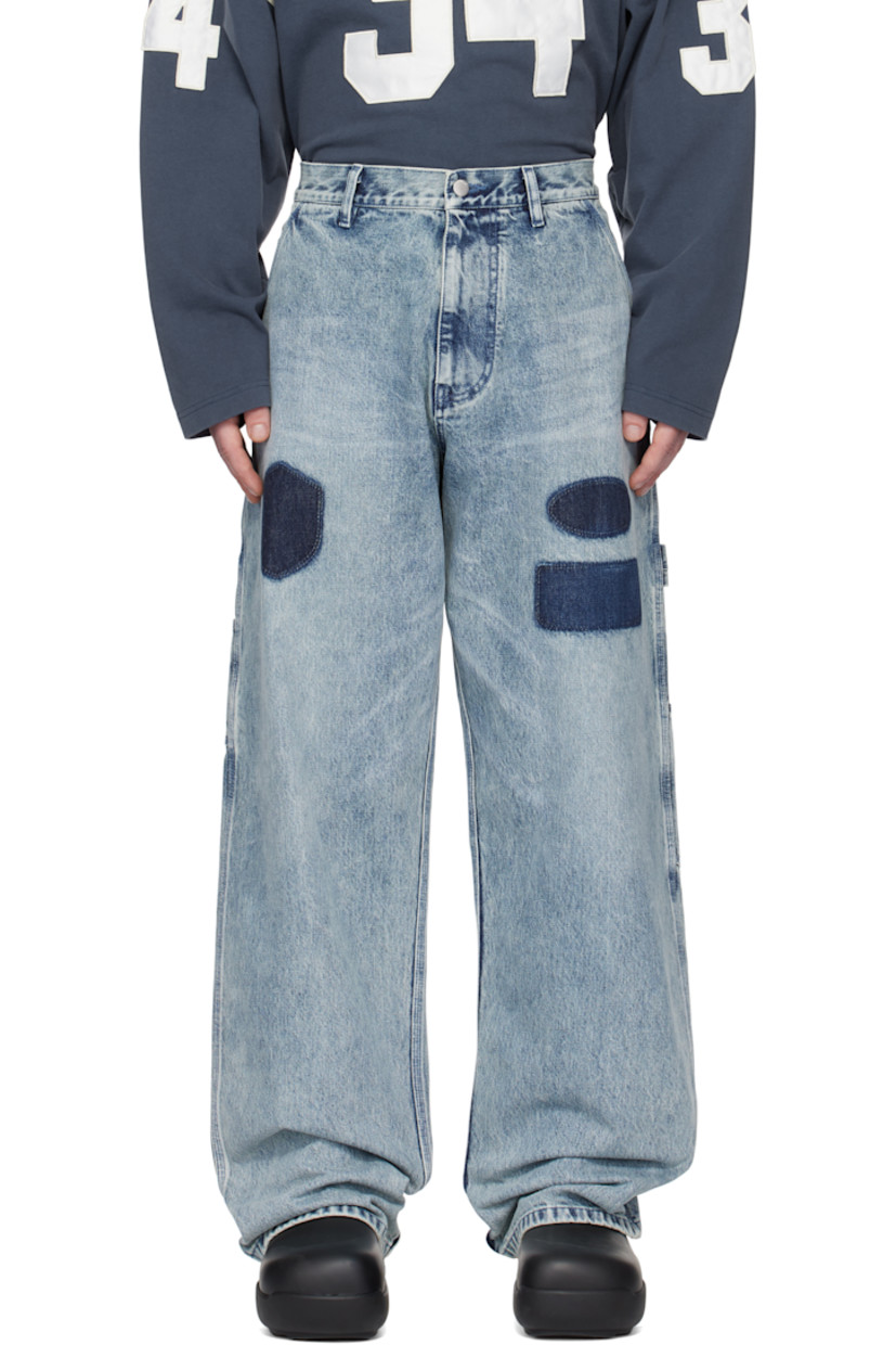 Relaxed-fit non-stretch denim jeans. Fading and whiskering throughout. 

· Belt loops
· Five-pocket styling
· Zip-fly
· Printed graphics at front 
· Patch pockets at outseams
· Hammer loop at outseam
· Logo-engraved silver-tone hardware

Supplier color: Light blue