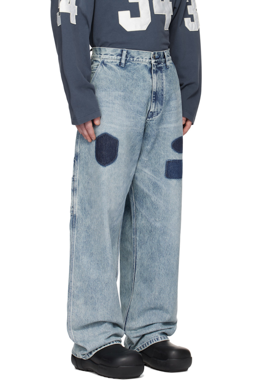 Relaxed-fit non-stretch denim jeans. Fading and whiskering throughout. 

· Belt loops
· Five-pocket styling
· Zip-fly
· Printed graphics at front 
· Patch pockets at outseams
· Hammer loop at outseam
· Logo-engraved silver-tone hardware

Supplier color: Light blue