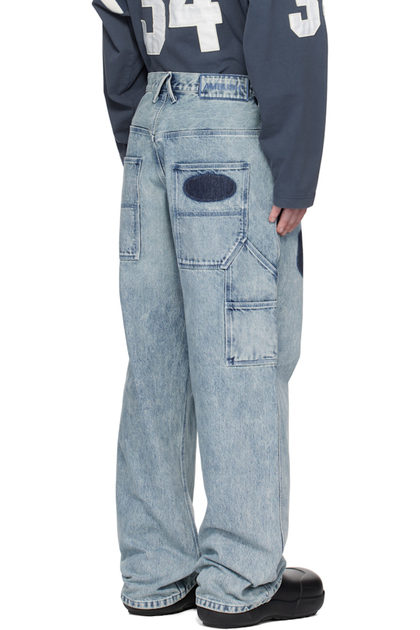 Relaxed-fit non-stretch denim jeans. Fading and whiskering throughout. 

· Belt loops
· Five-pocket styling
· Zip-fly
· Printed graphics at front 
· Patch pockets at outseams
· Hammer loop at outseam
· Logo-engraved silver-tone hardware

Supplier color: Light blue