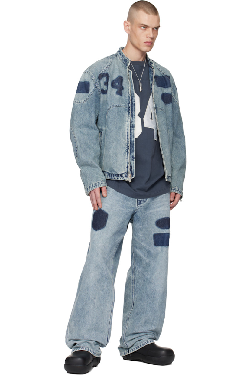 Relaxed-fit non-stretch denim jeans. Fading and whiskering throughout. 

· Belt loops
· Five-pocket styling
· Zip-fly
· Printed graphics at front 
· Patch pockets at outseams
· Hammer loop at outseam
· Logo-engraved silver-tone hardware

Supplier color: Light blue