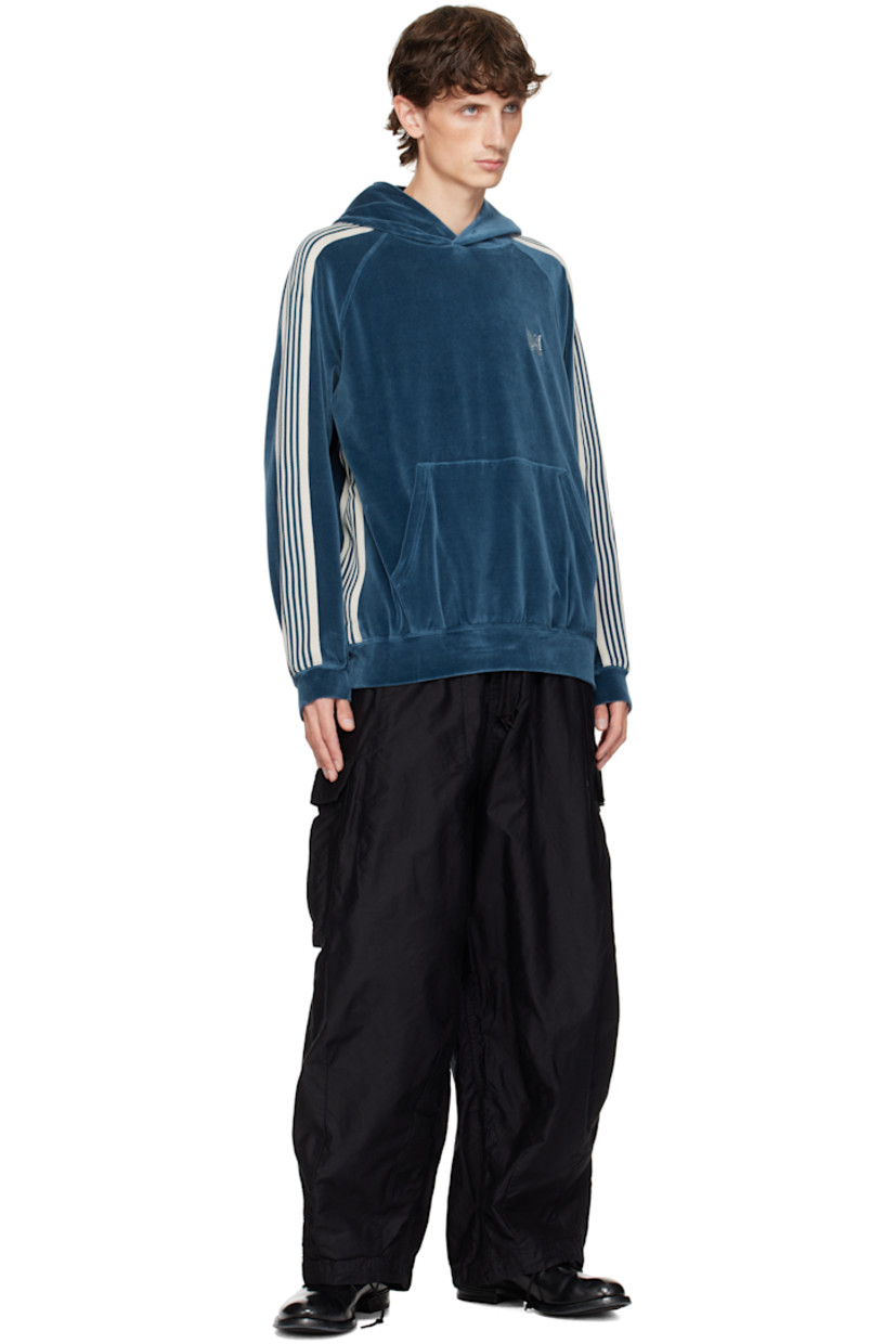 Cotton twill cargo pants.

· Belt loops
· Cord lock drawstring at waistband
· Four-pocket styling
· Zip-fly
· Darts and drawstring at cuffs
· Cargo pocket at outseams

Supplier color: B-black