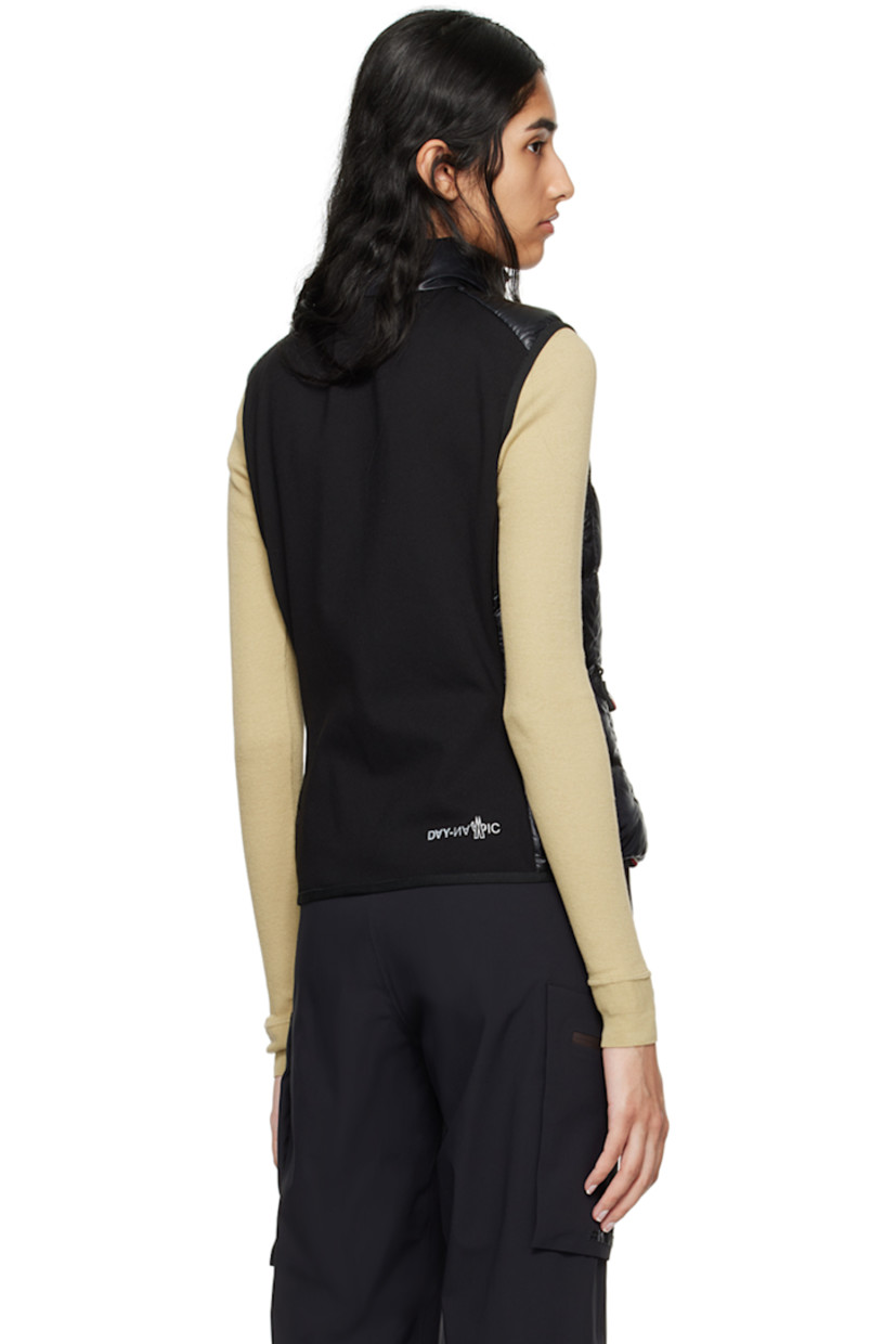 DIST-certified down-filled and quilted nylon ripstop and stretch nylon jersey vest. 

· Breathable, quick-drying, and moisture-wicking
· Paneled construction 
· Stand collar
· Zip closure
· Embroidered logo patch at chest
· Zip pockets
· Elasticized hem and armscyes 
· Text printed at back
· Partial mesh lining

Part of the Day-Namic collection.

Supplier color: Black

Fill: 90% goose down, 10% feather.
