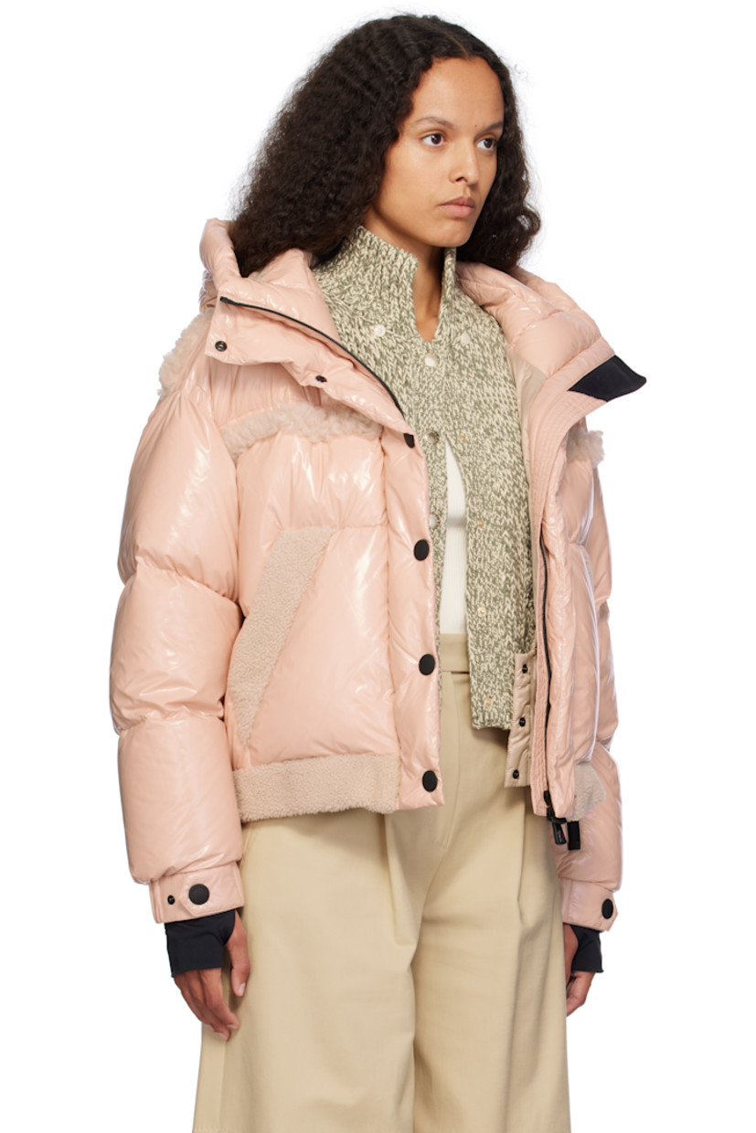 DIST-certified down-filled lightweight nylon satin jacket. Shearling trim throughout.

· Windproof, water-repellent, and breathable
· Bungee-style drawstring at hood
· Stand collar
· Two-way zip closure with press-stud placket
· Adjustable press-stud tab at elasticized cuffs
· Thumbhole at inset jersey cuffs
· Zip pocket at interior
· Snow skirt with elasticized hem at interior
· Full satin lining

Supplier color: Mauve

Fill: 90% goose down, 10% feather.