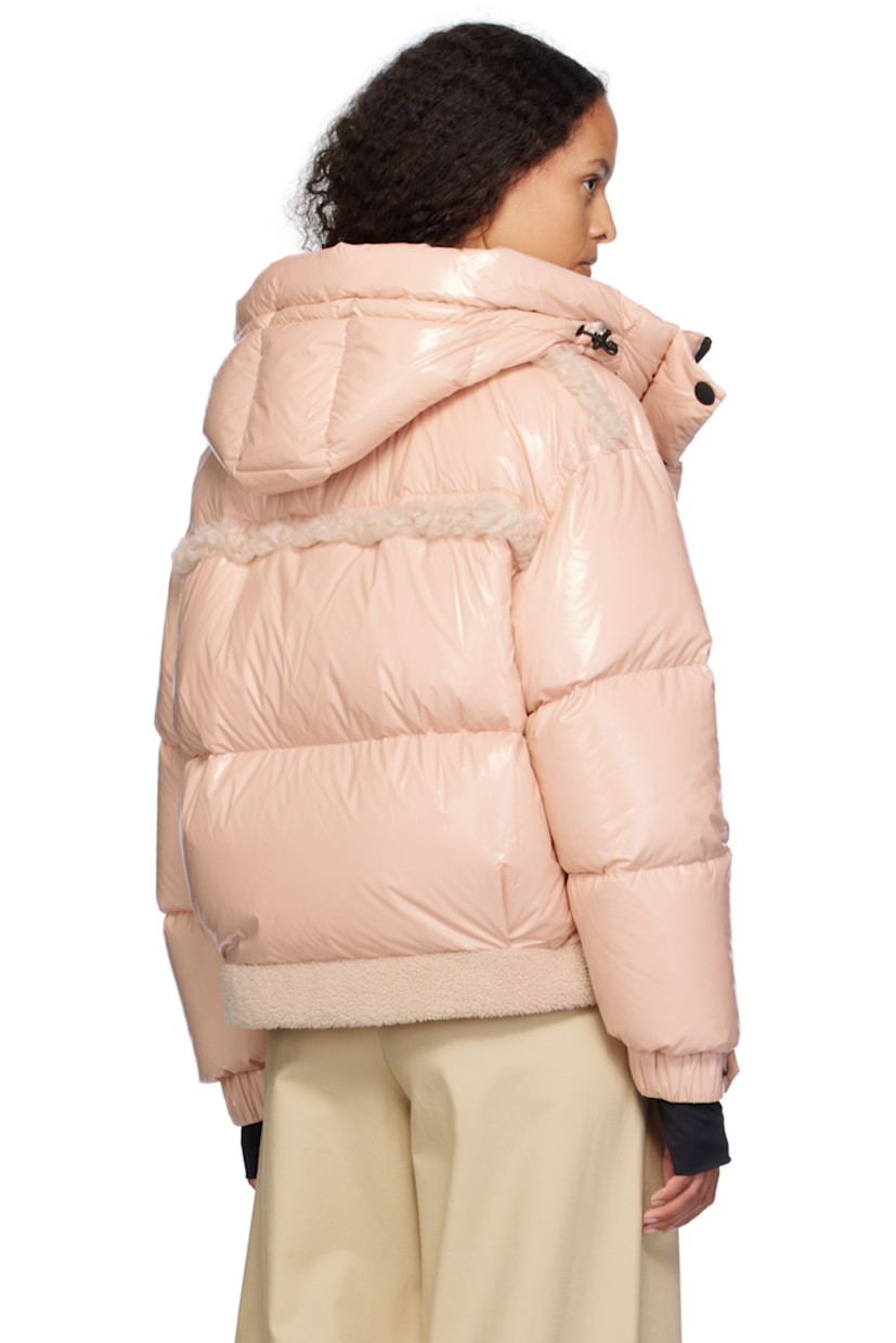 DIST-certified down-filled lightweight nylon satin jacket. Shearling trim throughout.

· Windproof, water-repellent, and breathable
· Bungee-style drawstring at hood
· Stand collar
· Two-way zip closure with press-stud placket
· Adjustable press-stud tab at elasticized cuffs
· Thumbhole at inset jersey cuffs
· Zip pocket at interior
· Snow skirt with elasticized hem at interior
· Full satin lining

Supplier color: Mauve

Fill: 90% goose down, 10% feather.
