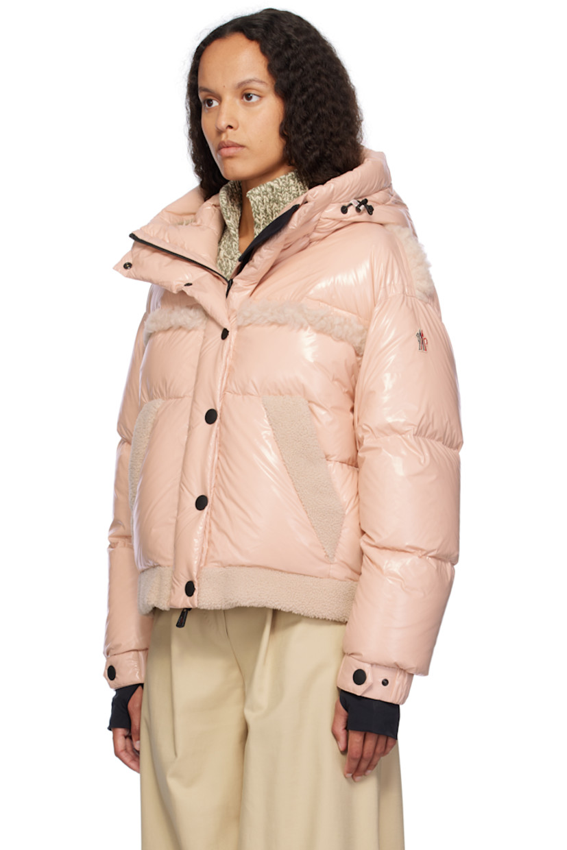 DIST-certified down-filled lightweight nylon satin jacket. Shearling trim throughout.

· Windproof, water-repellent, and breathable
· Bungee-style drawstring at hood
· Stand collar
· Two-way zip closure with press-stud placket
· Adjustable press-stud tab at elasticized cuffs
· Thumbhole at inset jersey cuffs
· Zip pocket at interior
· Snow skirt with elasticized hem at interior
· Full satin lining

Supplier color: Mauve

Fill: 90% goose down, 10% feather.