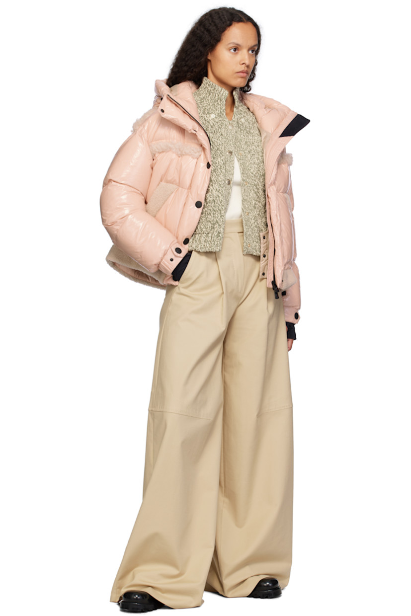 DIST-certified down-filled lightweight nylon satin jacket. Shearling trim throughout.

· Windproof, water-repellent, and breathable
· Bungee-style drawstring at hood
· Stand collar
· Two-way zip closure with press-stud placket
· Adjustable press-stud tab at elasticized cuffs
· Thumbhole at inset jersey cuffs
· Zip pocket at interior
· Snow skirt with elasticized hem at interior
· Full satin lining

Supplier color: Mauve

Fill: 90% goose down, 10% feather.