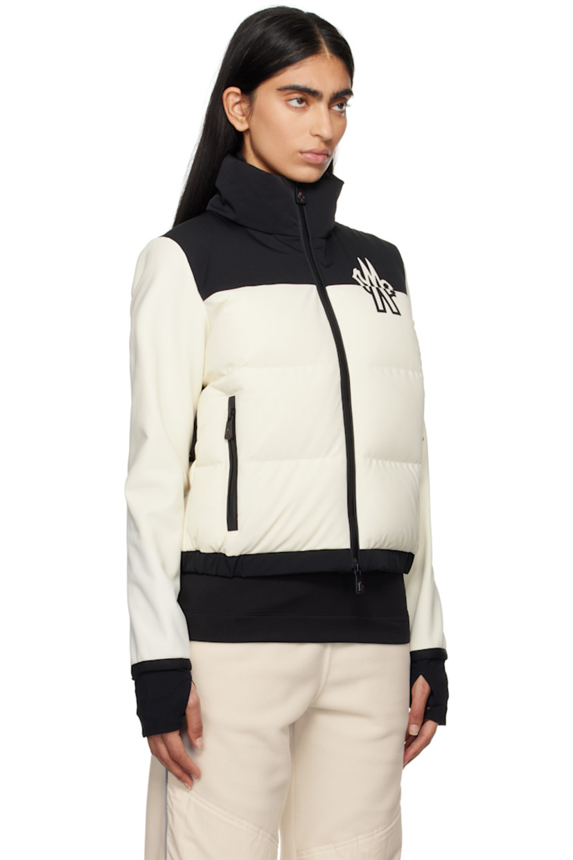 DIST-certified down-filled stretch polyester-blend taffeta and jersey jacket.

· Funnel neck
· Two-way zip closure
· Logo printed at chest and back
· Zip pockets
· Elasticized hem
· Inset jersey cuffs
· Thumbhole at cuffs
· Partial fleece lining

Supplier color: Beige

Fill 1: 90% goose down, 10% feather. Fill 2: 100% polyester.