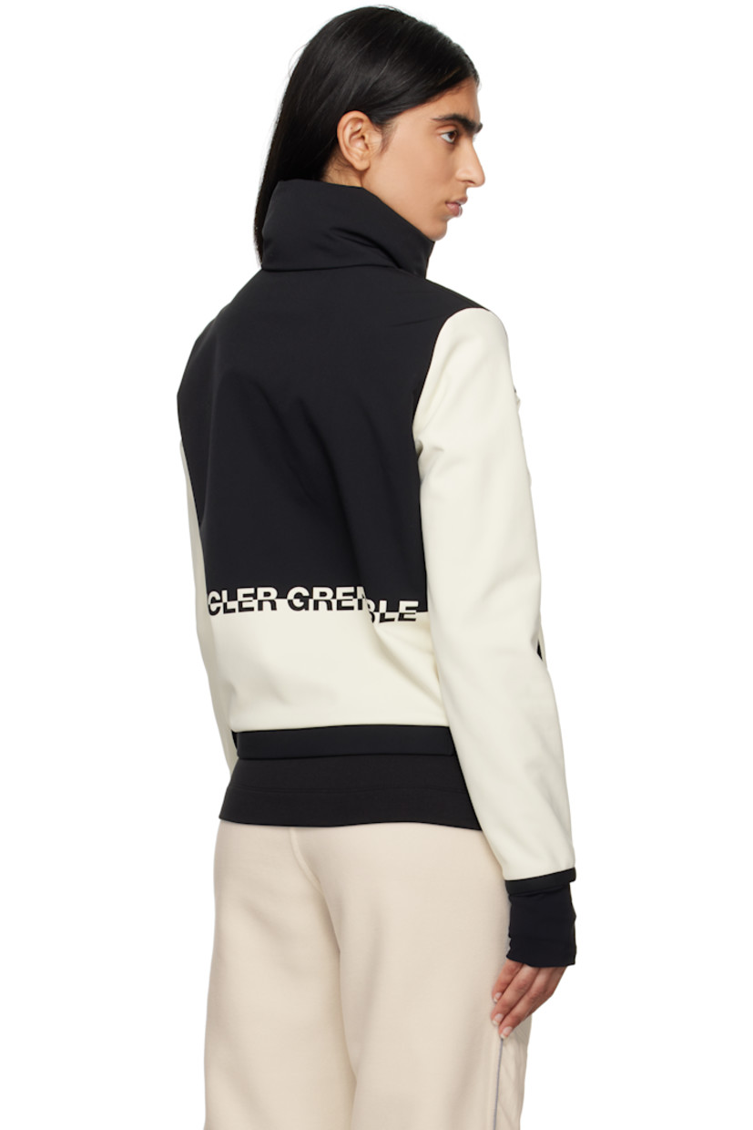 DIST-certified down-filled stretch polyester-blend taffeta and jersey jacket.

· Funnel neck
· Two-way zip closure
· Logo printed at chest and back
· Zip pockets
· Elasticized hem
· Inset jersey cuffs
· Thumbhole at cuffs
· Partial fleece lining

Supplier color: Beige

Fill 1: 90% goose down, 10% feather. Fill 2: 100% polyester.