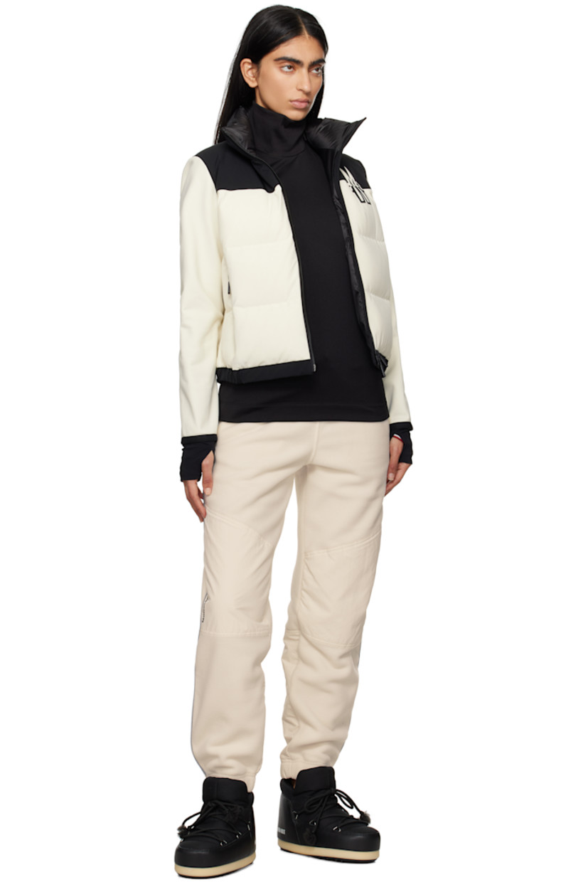 DIST-certified down-filled stretch polyester-blend taffeta and jersey jacket.

· Funnel neck
· Two-way zip closure
· Logo printed at chest and back
· Zip pockets
· Elasticized hem
· Inset jersey cuffs
· Thumbhole at cuffs
· Partial fleece lining

Supplier color: Beige

Fill 1: 90% goose down, 10% feather. Fill 2: 100% polyester.