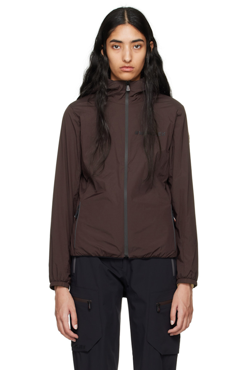 Packable stretch nylon ripstop jacket. Lightweight, breathable, water-repellent, and windproof. 

· Partially elasticized hood
· Stand collar
· Zip closure
· Logo bonded at chest
· Zip pockets
· Elasticized hem and cuffs
· Embroidered logo patch at sleeve
· Text printed at back hem
· Patch pocket at interior
· Full polyester mesh lining 

Part of the Day-Namic collection.

Supplier color: Dark brown