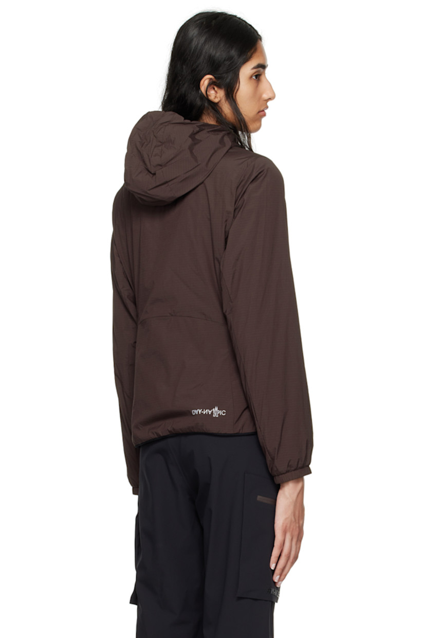 Packable stretch nylon ripstop jacket. Lightweight, breathable, water-repellent, and windproof. 

· Partially elasticized hood
· Stand collar
· Zip closure
· Logo bonded at chest
· Zip pockets
· Elasticized hem and cuffs
· Embroidered logo patch at sleeve
· Text printed at back hem
· Patch pocket at interior
· Full polyester mesh lining 

Part of the Day-Namic collection.

Supplier color: Dark brown