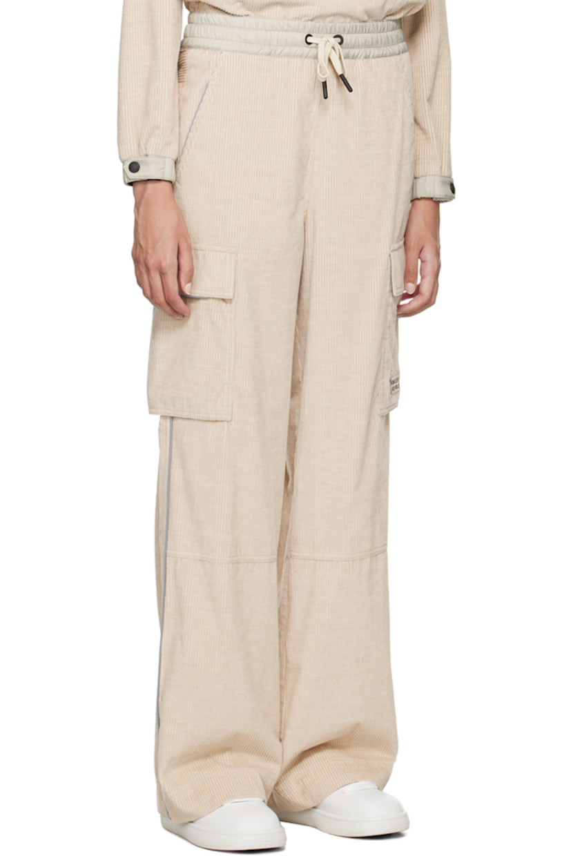 Lightweight and breathable cotton corduroy lounge pants. Reflective trim throughout. 

· Drawstring at elasticized waistband 
· Two pocket styling
· Logo patch at front
· Cargo pocket at outseams
· Locker loop at back waistband
· Logo flag at back 
· Partial nylon taffeta lining 

Supplier color: Pink