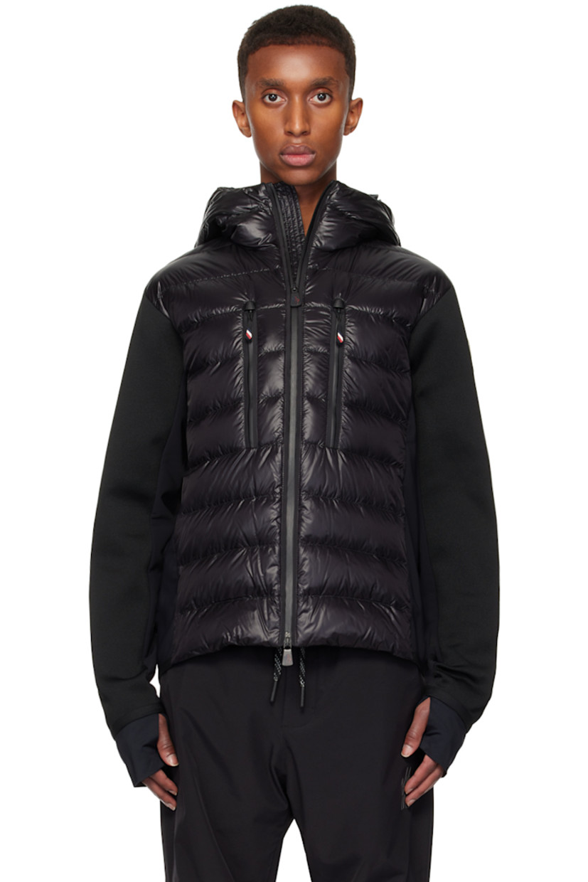 DIST-certified down-filled and quilted nylon laqué, polyester jersey, and knit stretch polyester-blend jacket. Breathable and lightweight.

· Paneled construction
· Webbing trim at hood
· Two-way zip closure
· Zip pockets
· Elasticized curved hem and cuffs
· Embroidered logo patch at sleeve 
· Thumbhole at inset jersey cuffs
· Partial ripstop and fleece lining

Part of the Après-Ski collection.

Supplier color: Black

Fill: 90% goose down, 10% feather.
