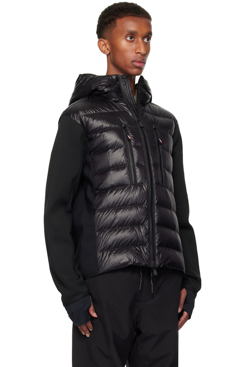 DIST-certified down-filled and quilted nylon laqué, polyester jersey, and knit stretch polyester-blend jacket. Breathable and lightweight.

· Paneled construction
· Webbing trim at hood
· Two-way zip closure
· Zip pockets
· Elasticized curved hem and cuffs
· Embroidered logo patch at sleeve 
· Thumbhole at inset jersey cuffs
· Partial ripstop and fleece lining

Part of the Après-Ski collection.

Supplier color: Black

Fill: 90% goose down, 10% feather.