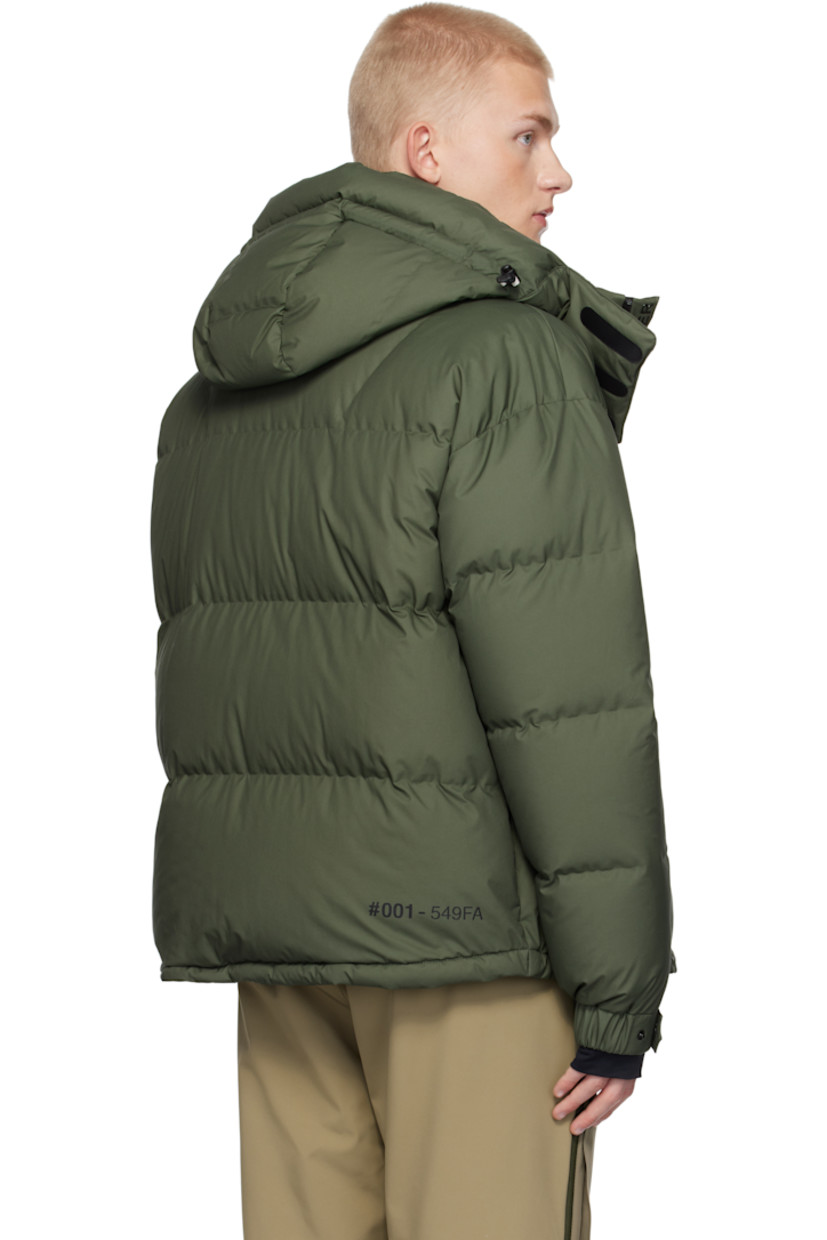 Down-filled and quilted nylon taffeta jacket. Windproof, water-repellent, lightweight, and breathable.

· Detachable hood
· Bungee-style drawstring and velcro tab at hood
· Two-way zip closure with press-stud placket
· Logo bonded at placket and sleeve
· Zip pockets
· Concealed bungee-style drawstring at hem
· Embroidered logo patch and zip pocket at sleeve
· Adjustable press-stud elasticized barrel cuffs
· Thumbhole at inset jersey cuffs
· Bonded text at back hem
· Zip pocket and snow skirt at interior
· Full ripstop lining

Supplier color: Green

Fill: 90% goose down, 10% goose feather.