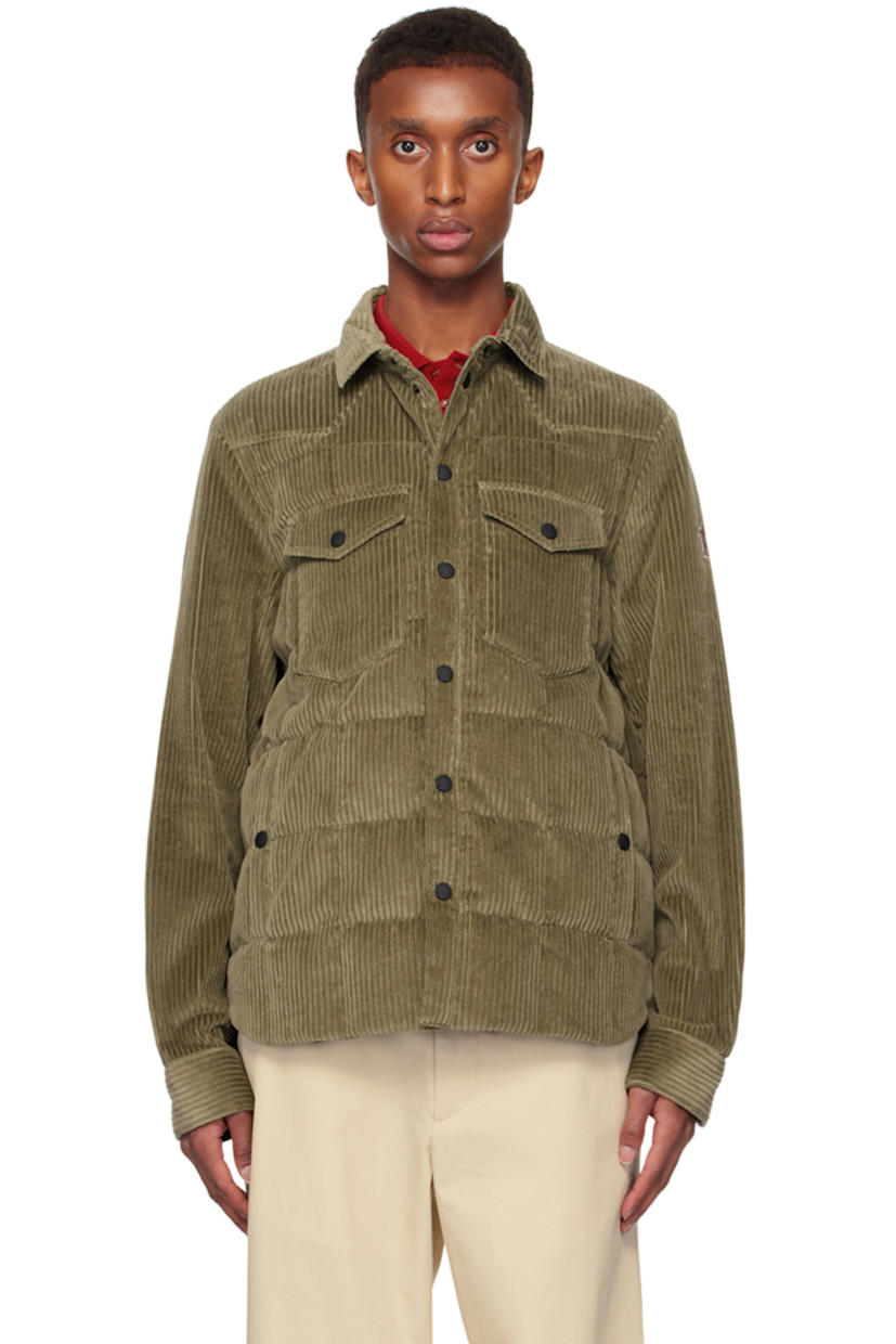 DIST-certified down-filled and quilted stretch cotton corduroy jacket. Breathable and lightweight.

· Spread collar 
· Press-stud closure
· Flap and welt pockets
· Shirttail hem
· Embroidered logo patch at sleeve
· Adjustable single-press-stud barrel cuffs
· Zip pocket at interior
· Full ripstop lining
· Logo-engraved black hardware

Part of the Après-Ski collection.

Supplier color: Military green

Fill 1: 90% goose down, 10% feather.