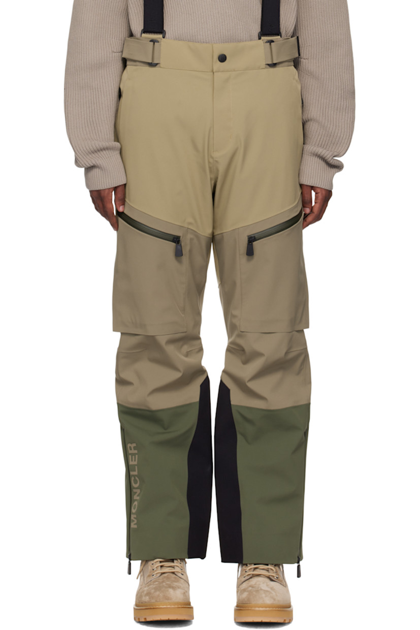 PrimaLoft®-insulated stretch nylon twill ski pants. Windproof, waterproof, breathable, and lightweight.

· Integrated RECCO® rescue technology
· Paneled construction
· Velcro tabs at waistband
· Adjustable logo-woven elasticized suspender straps
· Four-pocket styling
· Zip-fly
· Darts at knees
· Logo bonded at leg
· Zip vent at cuffs and outseams
· Inset elasticized cuffs
· Rubberized logo flag at back waistband
· Partial brushed jersey and satin lining

Supplier color: Khaki green