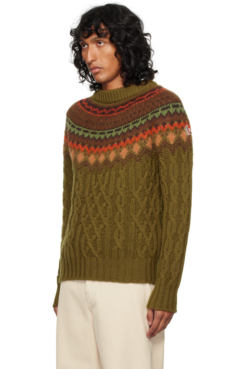 Cable-knit wool- and alpaca-blend sweater. 

· Rib-knit mock neck, hem, and cuffs
· Embroidered logo patch at shoulder 

Supplier color: Khaki