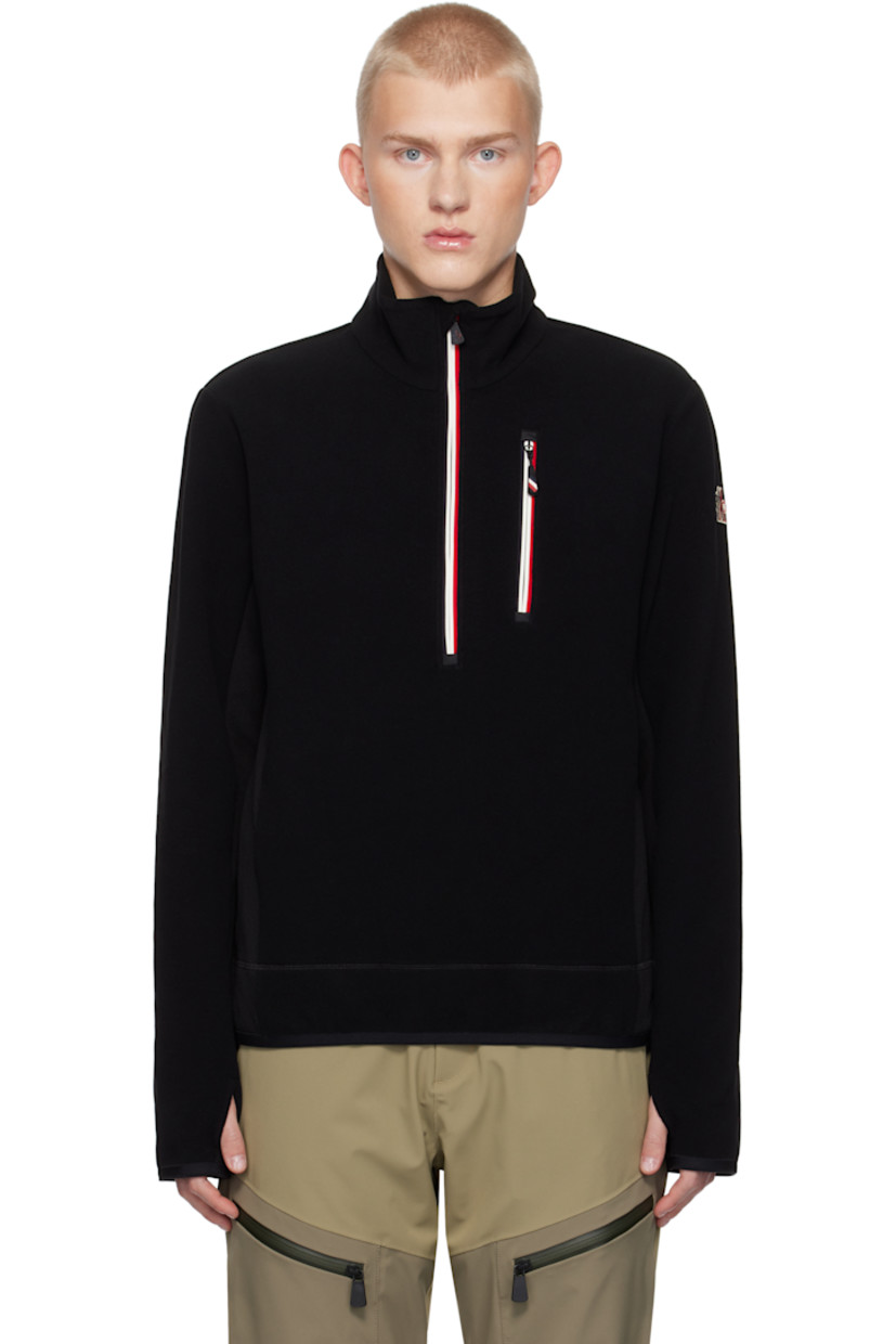 Insulated stretch polyester fleece jacket. Windproof, water-repellent, breathable, and lightweight.

· Stand collar
· Half-zip closure
· Zip pocket 
· Elasticized hem and cuffs
· Embroidered logo patch at sleeve
· Thumbhole at cuffs

Supplier color: Black
