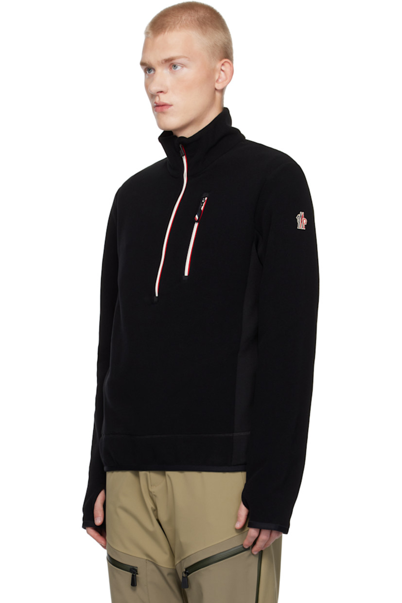 Insulated stretch polyester fleece jacket. Windproof, water-repellent, breathable, and lightweight.

· Stand collar
· Half-zip closure
· Zip pocket 
· Elasticized hem and cuffs
· Embroidered logo patch at sleeve
· Thumbhole at cuffs

Supplier color: Black