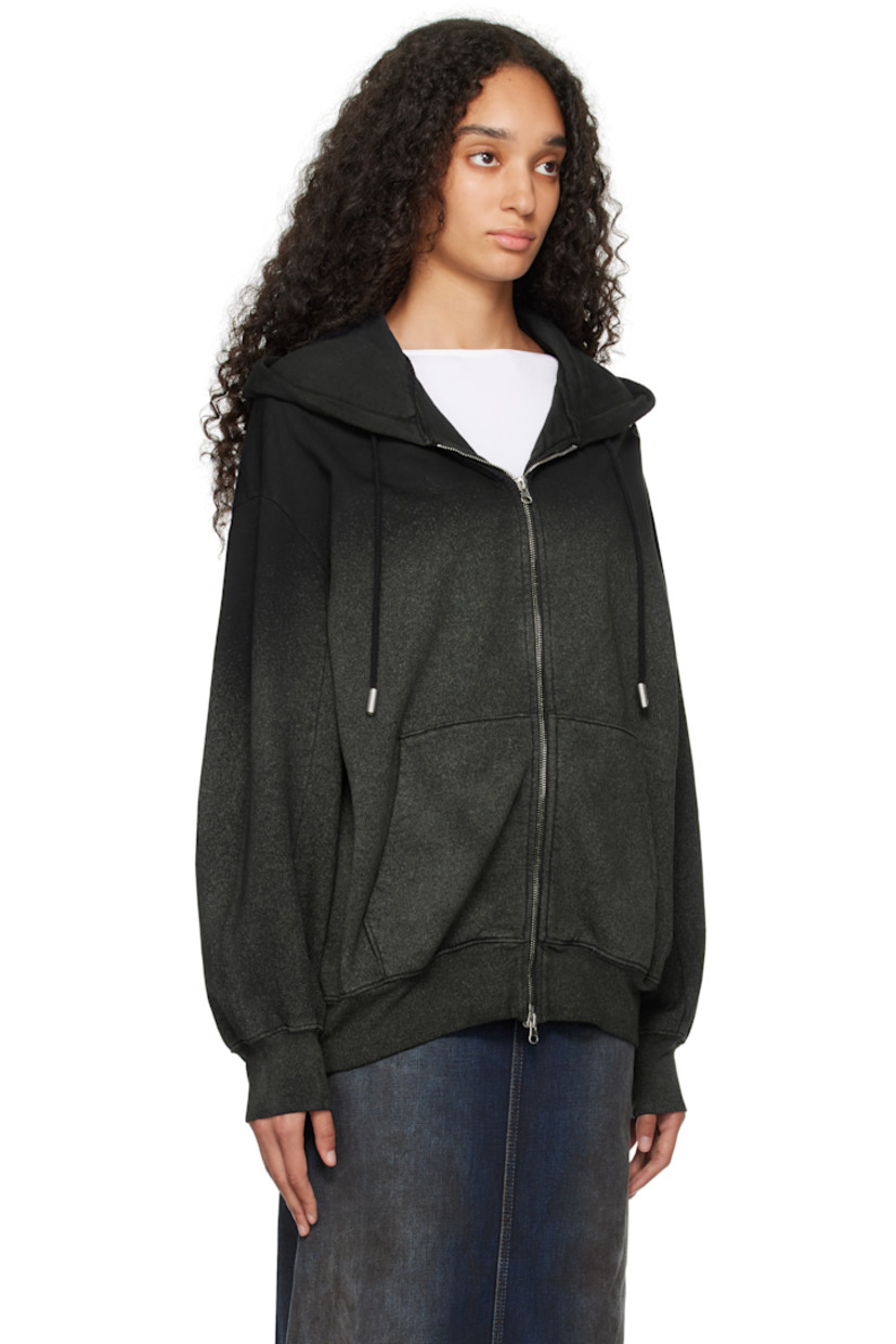 Brushed French terry hoodie. Sprayed pattern throughout.

· Drawstring at hood
· Two-way zip closure
· Patch pockets
· Rib knit hem and cuffs
· Dropped shoulders
· Logo bonded at shoulder

Supplier color: Astroturf
