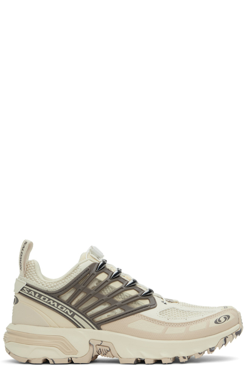 Low-top mesh and buffed faux-leather sneakers in beige.

· Rubberized trim throughout
· Logo printed at toe and outer side
· Quicklace™ closure
· Logo patch at padded tongue
· Padded collar
· Logo-bonded pull-loops at heel collar
· Molded OrthoLite® insole
· Jersey lining
· Agile Chassis™ System at foam rubber midsole
· Treaded Contagrip® rubber sole
· Logo-engraved gunmetal-tone hardware

Supplier color: Almond milk/Cement/Falcon
