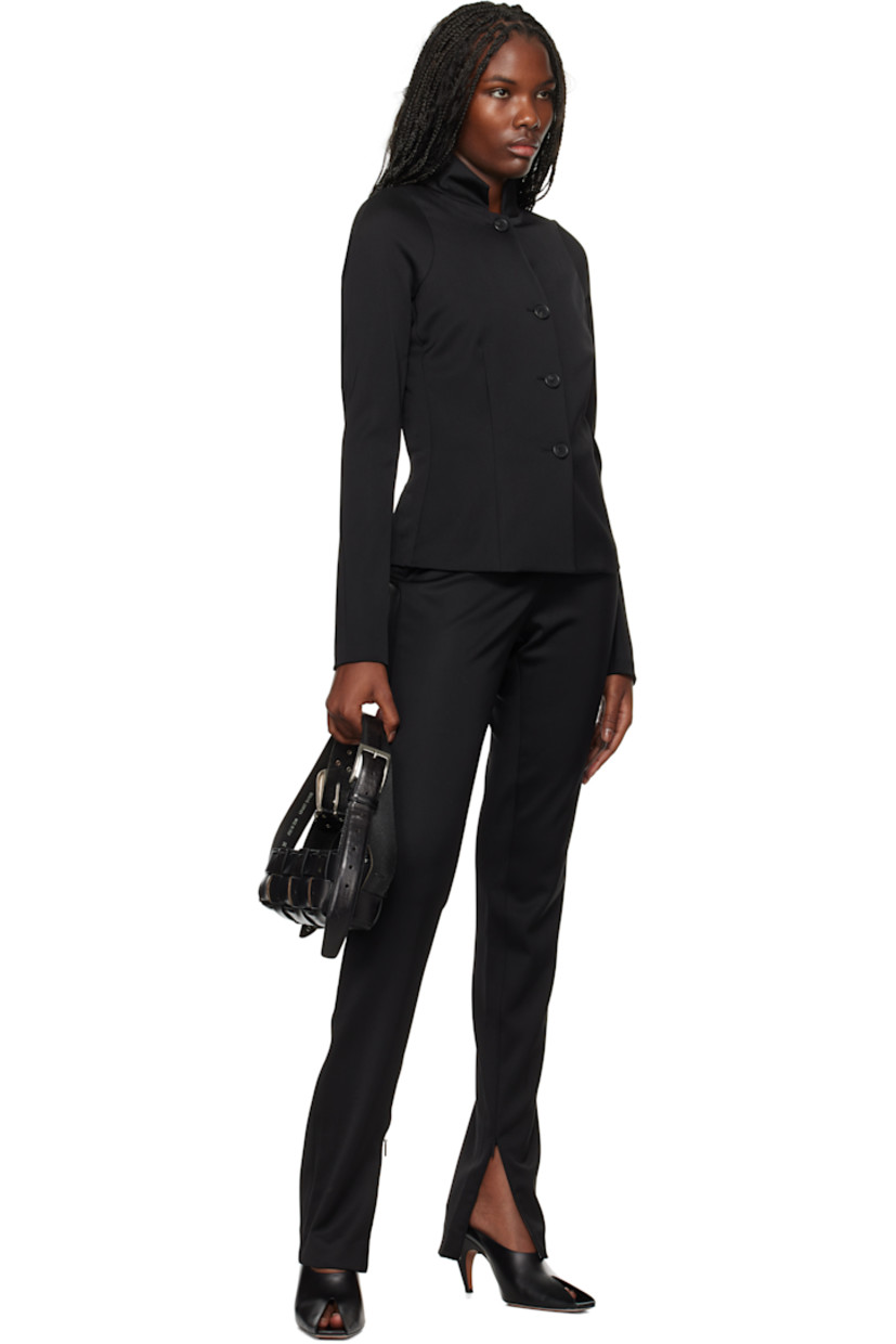 Stretch virgin wool-blend jersey jacket. 

· Spread collar 
· Button closure 
· Darts at front
· Rubberized logo at back collar

Supplier color: Black